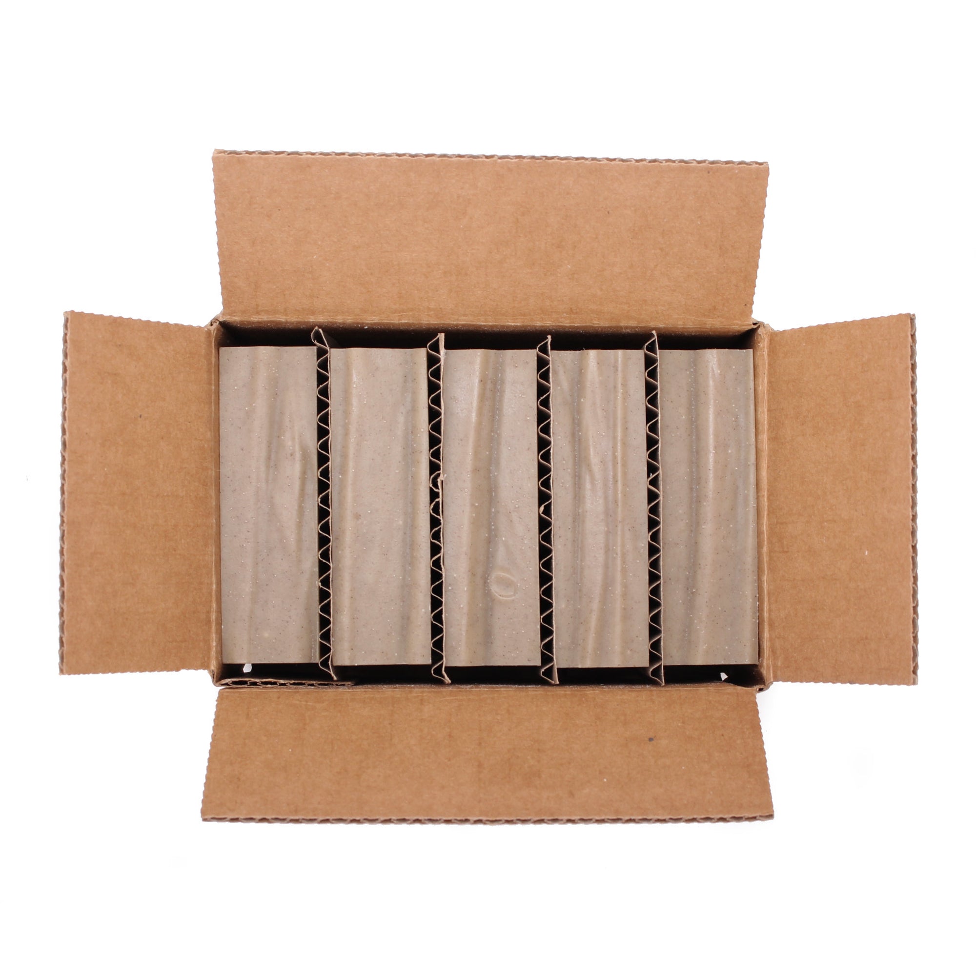 A naked five pack of unpackaged Aum Patchouli essential oil organic bar soap from Ground Soap in a shipping box.