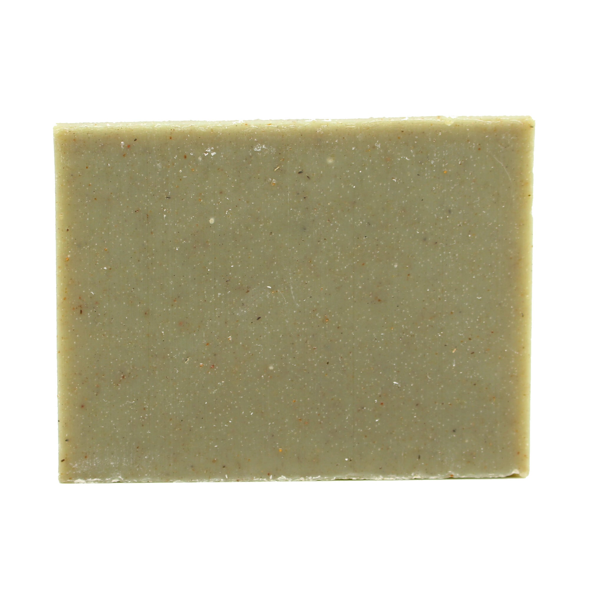 A naked bar of "Grove" cedar & pine essential oil and rhassoul clay organic bar soap from ground Soap. 