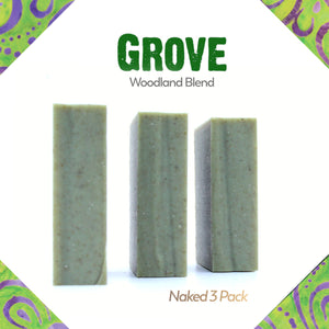 A naked three pack of Grove cedar & pine essential oil and rhassoul clay organic bar soap from ground Soap.