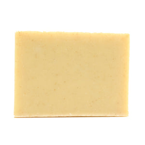 A naked bar of Plain Jane Unscented organic bar soap from ground Soap. 